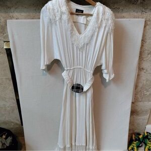 Elegant White Dress with Lace Details